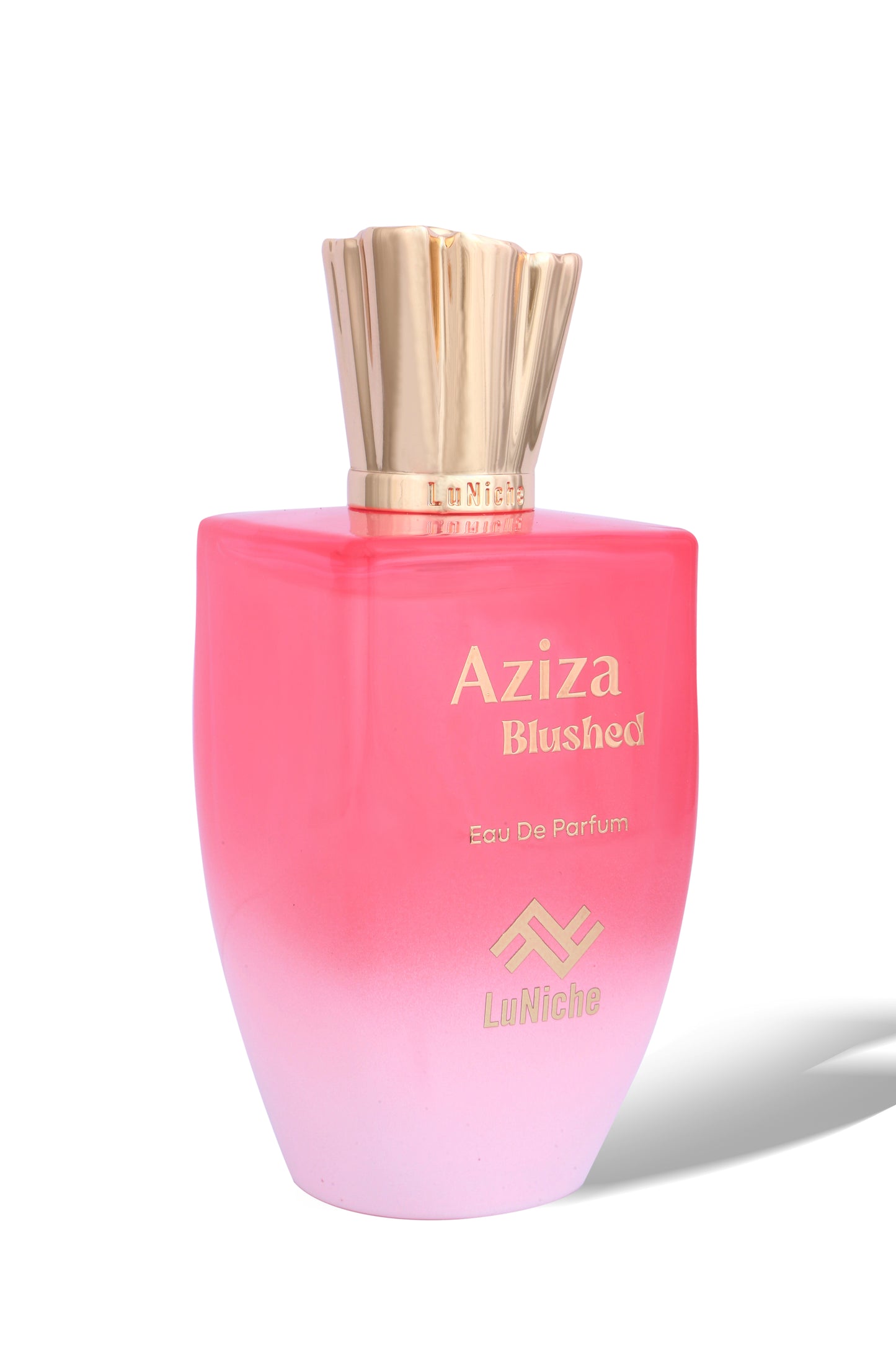 Pink and gold perfume bottle labeled 'Aziza Blushed' on a white background